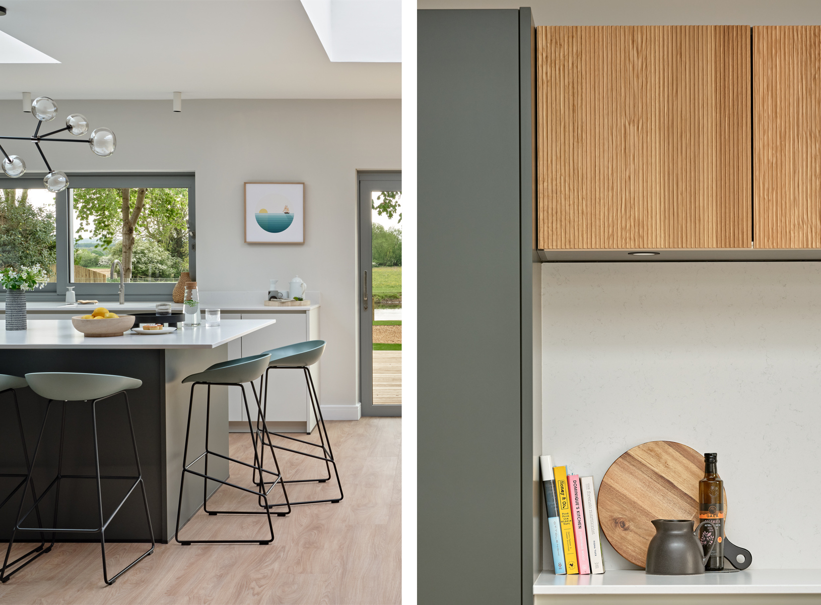 Contemporary dark green kitchen island with modern green and black stools and close up photo of oak fluted high cupboards