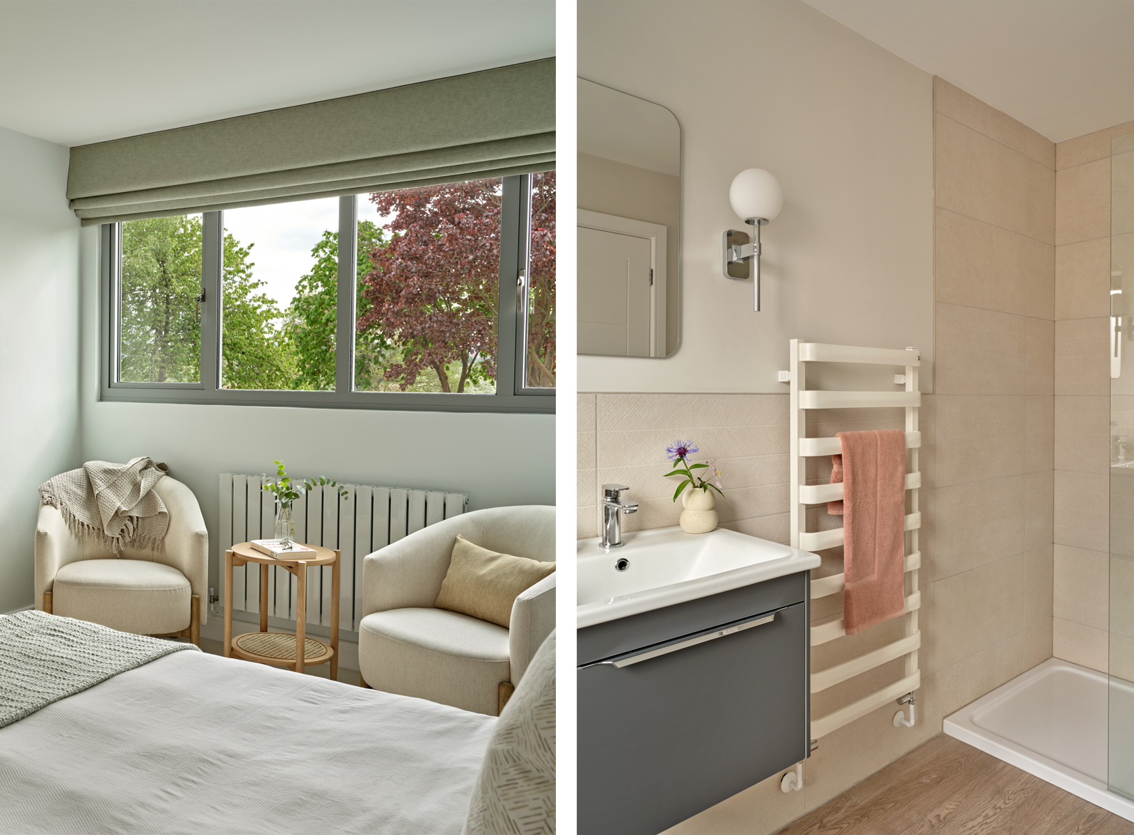 Green and pale blue bedroom with two cream armchairs and side table in oak, and neutral modern ensuite bathroom in grey and soft coral colours